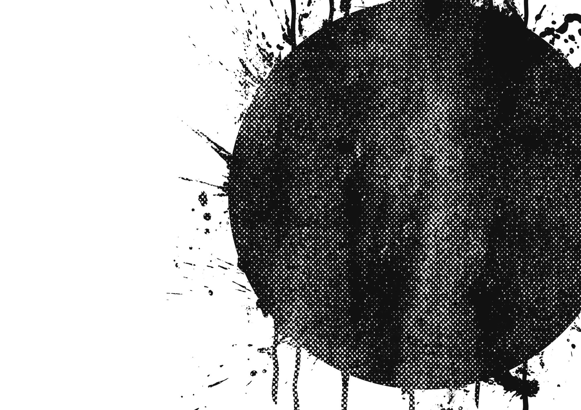 A textured black circle with ink splatter around the outside